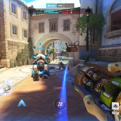 Gra Overwatch w akcji, widok z perspektywy gracza. Na ekranie widać postacie, interfejs gry i elementy otoczenia. Sprawdź wymagania Overwatch, by cieszyć się rozgrywką.