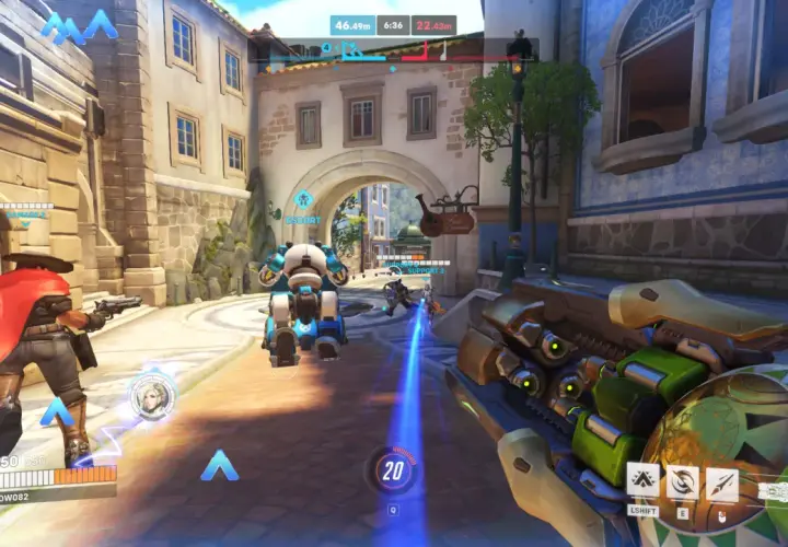 Gra Overwatch w akcji, widok z perspektywy gracza. Na ekranie widać postacie, interfejs gry i elementy otoczenia. Sprawdź wymagania Overwatch, by cieszyć się rozgrywką.