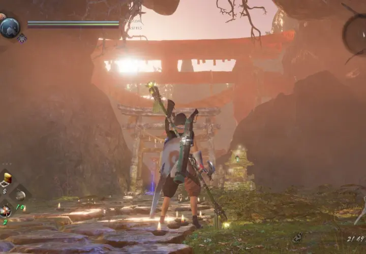 Postać w grze Nioh 2 stoi przed bramą torii w mistycznej scenerii.