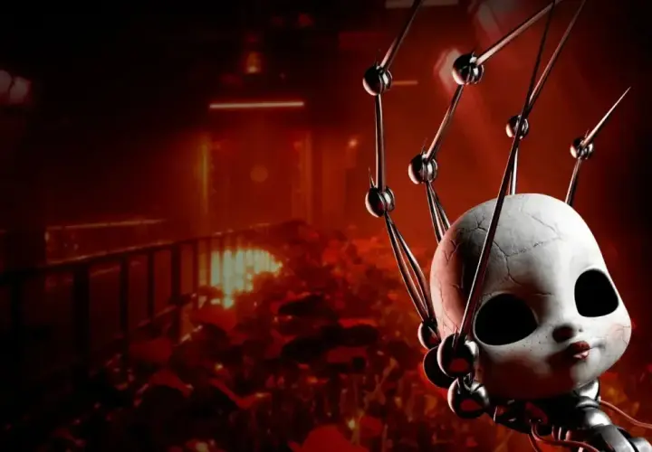 Przerażająca głowa lalki z pęknięciami, otoczona mechanicznymi ramionami, na tle mrocznego, czerwonego korytarza. Zapowiedź Poppy Playtime Chapter 5.