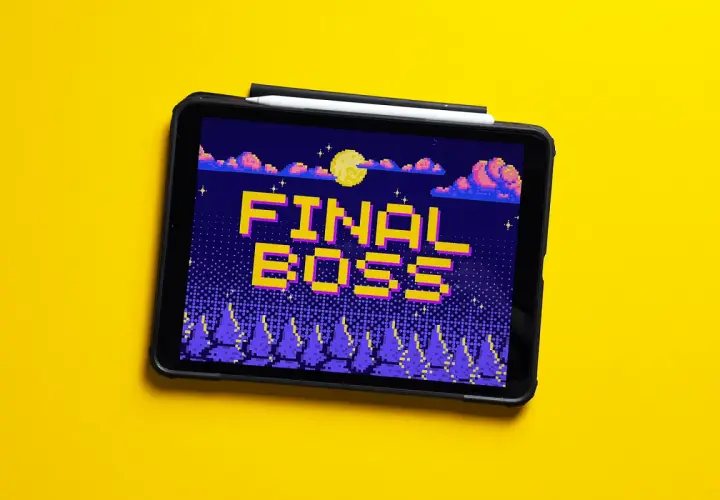 Tablet z grą retro, na ekranie napis "FINAL BOSS" w pikselowym stylu, nocny krajobraz z księżycem i chmurami.