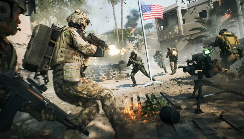 Żołnierze w kamuflażu walczą na **battlefield 7**, strzelając z broni, płonie ogień, a amerykańska flaga powiewa na wietrze.