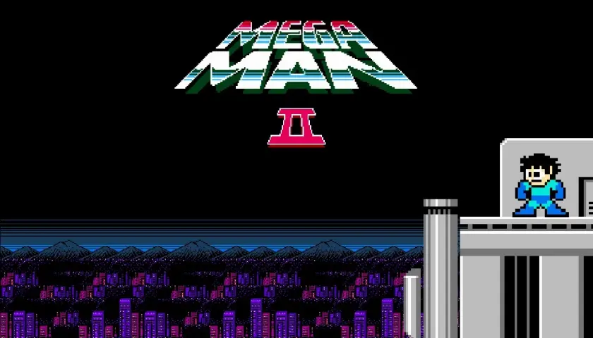 Tytuł gry Mega Man 2 z niebieskim bohaterem na tle nocnego miasta i gór.