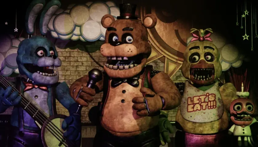 Freddy Fazbear i jego przyjaciele, Bonnie i Chica, występują na scenie.