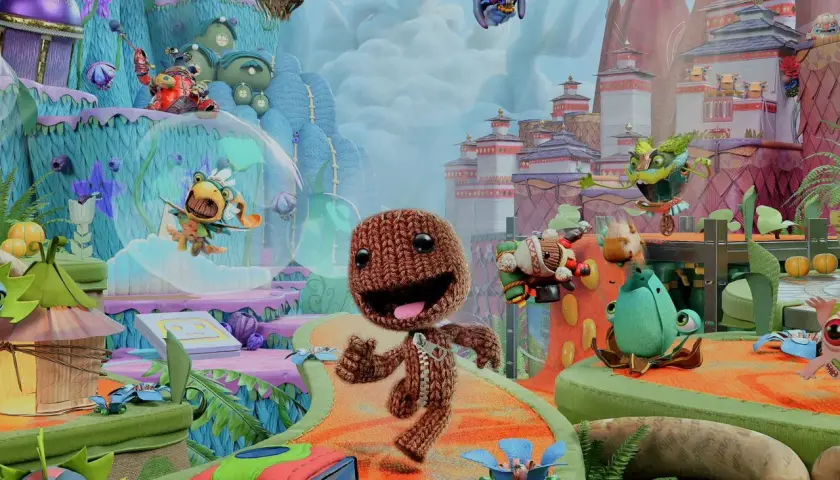 Kolorowy świat gry, gdzie Sackboy i jego przyjaciele przygotowują się do wspólnej zabawy. Idealne gry na 3 osoby, pełne przygód i śmiechu.