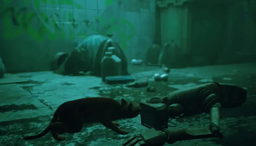Rudy kot z gry Stray 2 bada porzuconego robota w mrocznym zaułku.