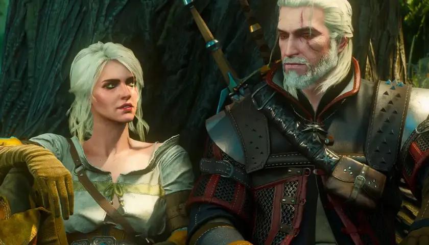 Geralt i Ciri, bohaterowie kultowego rpg, siedzą obok siebie w lesie.