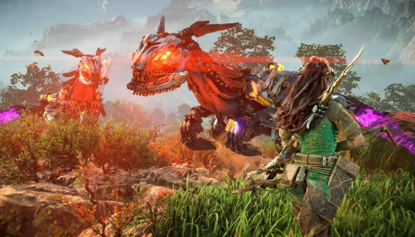 Aloy z Horizon Zero Dawn 2 walczy z dwoma mechanicznymi raptorami w słoneczny dzień.