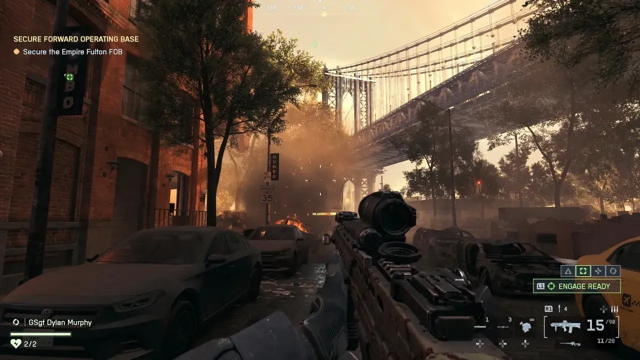 Wojna w mieście, płonące samochody i most w tle. To fragment kampanii Battlefield 6, gdzie gracz ma zabezpieczyć bazę.
